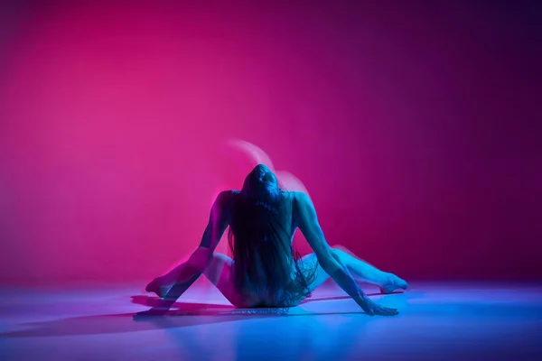 Passionate Movements Young Woman Dancing Bodysuit Gradient Pink Studio Background — ストック写真