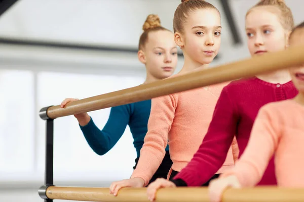 Beautiful Little Girls Children Gymnasts Training Indoors Stretching Exercises Barre — Stok Foto