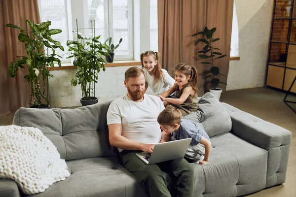 Mature Man Father Sitting Couch Home Working Remotely Laptop Three — Stock Photo, Image