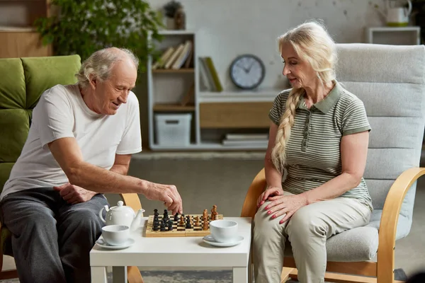 Happy Elderly Couple Retired Man Woman Spending Time Home Playing — Stock Photo, Image