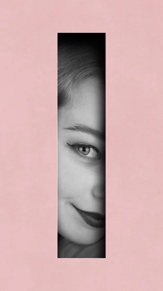 Tender flirty look. Black and white female face part against pink background. Contemporary art collage. Conceptual design. Concept of creativity, abstract art, imagination and inspiration.