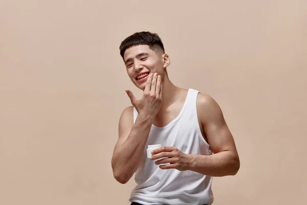 Portrait Smiling Handsome Young Guy Clean Spotless Face Applying Face — Stock Photo, Image