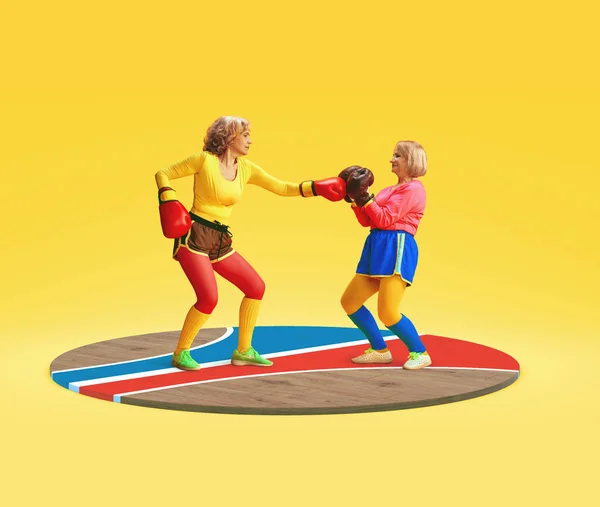 Två Äldre Medelålders Kvinnor Färgglad Uniform Utbildning Boxning Mot Gul — Stockfoto