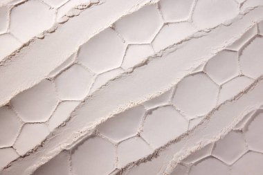 Pembe kum ve toz desenli bir görüntü. Duvar kağıdı, arkaplan, pankart için soyut tasarım. Dairesel izler. Yaratıcı sanat fotoğrafçılığı. Soyut doğa geçmişi. Minimalizm