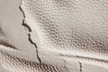 Dokulu duvar, kum, bir sürü noktalı toz resimleri. Duvar kağıdı ve arka plan için minimalist, soyut tasarım. Yaratıcı sanat fotoğrafçılığı. Soyut doğa geçmişi. Minimalizm
