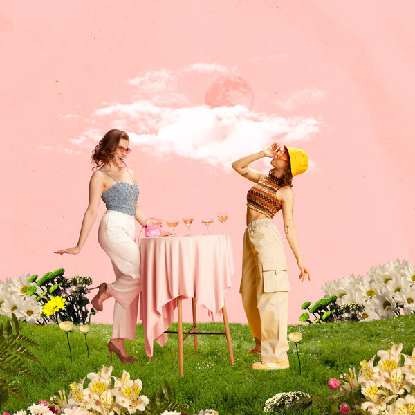 Beautiful, stylish, young girls standing at table on grass over pink sky. Summer party, relaxation. Contemporary art collage. Creative design. Concept of travelling, creativity, inspiration