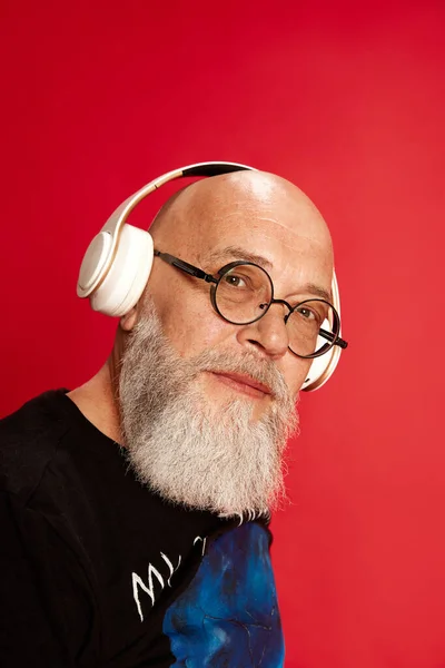 Close Portrait Mature Bearded Bald Man Glasses Listening Music Headphones — Stock Photo, Image