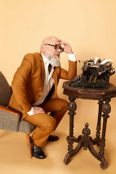 Portrait Thoughtful Bearded Mature Bald Man Elegant Classical Suit Sitting — Stock Photo, Image