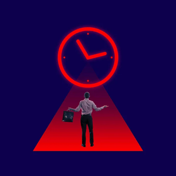Businessman Employee Standing Gian Neon Clock Icon Symbolizing Project Deadlines — Stock Photo, Image