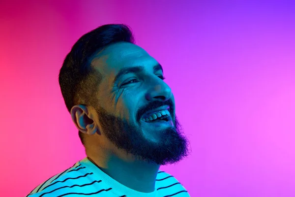 Portrait Bearded Handsome Man Cheerfully Smiling Gradient Studio Background Neon — Stock Photo, Image