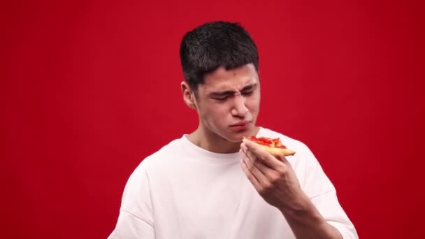 Spicy Taste Young Asian Guy Eating Slice Pizza Red Chilli — Stock Video