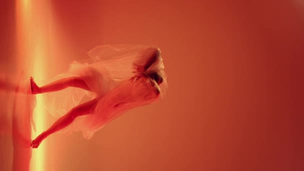 Tender Young Woman Ballerina Dancing Transparent Fabric Orange Studio Background — Stock Video