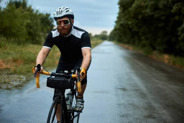 Concentrated Young Bearded Man Cyclist Uniform Helmet Glasses Riding Bike — Stock Photo, Image