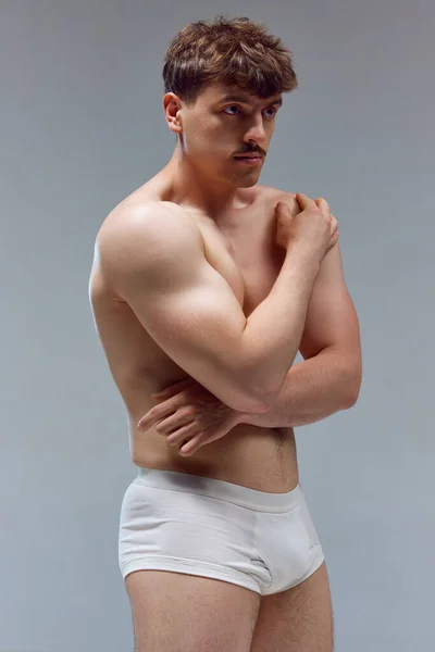 Handsome Young Man Muscular Body Posing Shirtless Underwear Grey Studio — Stock Photo, Image