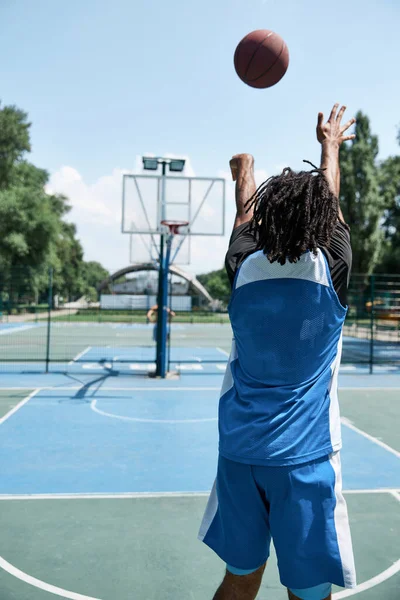 Concentrated Young Man Athlete Blue Uniform Playing Basketball Throwing Ball — Stock Photo, Image