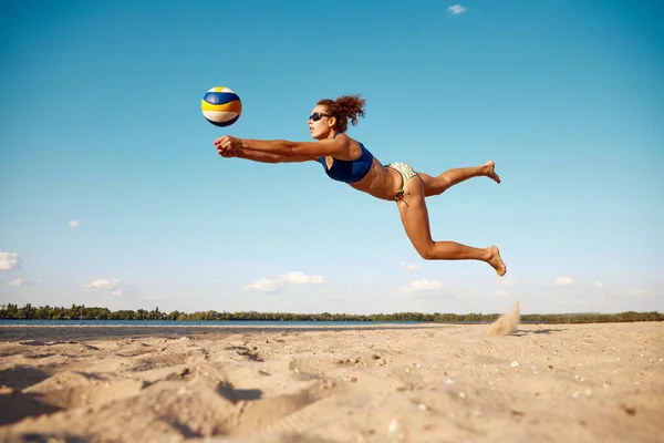 Dynamic Image Young Woman Motion Playing Beach Volleyball Hitting Ball — Stock Photo, Image