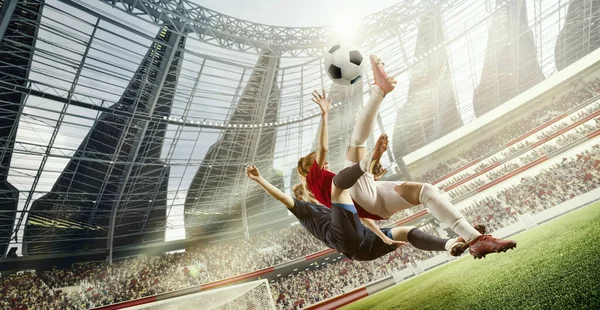 テンセスゲームの瞬間 2人の女性のダイナミックなイメージ 運動中のサッカー選手 3Dオープンエアスタジアムで試合中にジャンプでボールを打つ プロスポーツ ダイナミクス ゲーム 広告のコンセプト — ストック写真