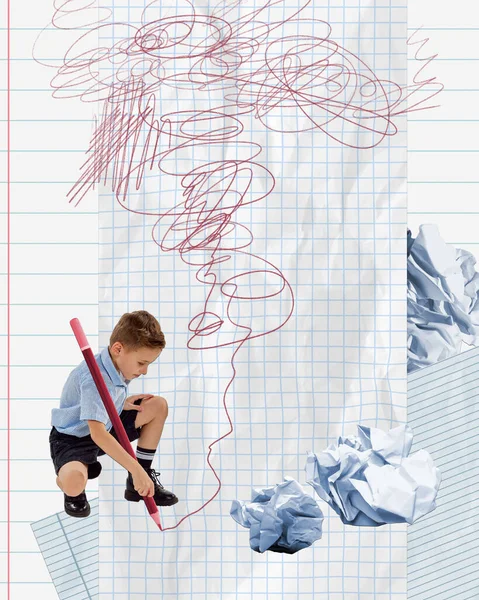 Conceptual art collage. Little school boy, child drawing on notebook sheet with giant pencil. Lessons and homework. Concept of education, childhood, school, back to school, emotions, ad