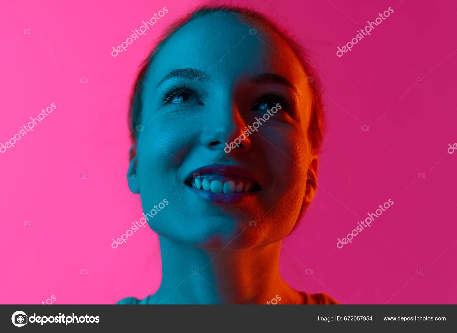 Close Portrait Young Smiling Girl Looking Upwards Pink Studio
