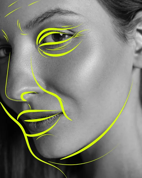 Close-up of female face with bright lines, doodles. Black and white image. Cosmetology and plastic surgery. Concept of weight loss, body care, fitness, beauty, diet, health, wellness. Ad.