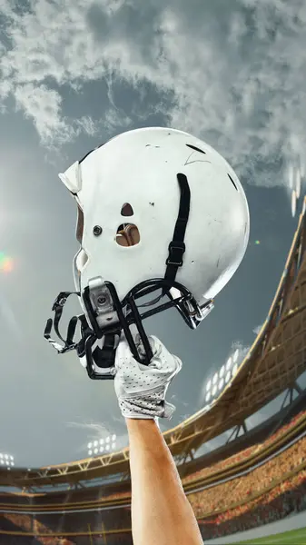 Male Hand Holding Helmet Stadium Sky Background Winner American Football — Stock Photo, Image