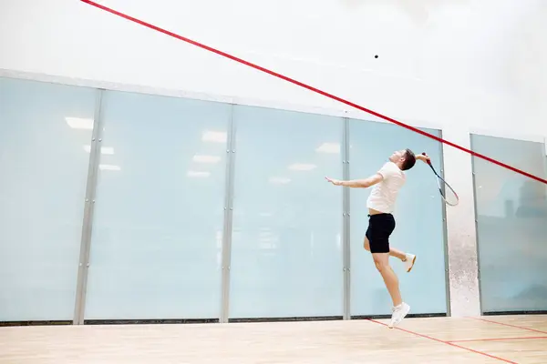 Young Sportive Man Playing Training Squash Squash Court Hitting Ball — Stock Photo, Image
