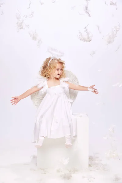 Happy Smiling Positive Little Girl Child Costume Angel Sitting Isolated — Stock Photo, Image