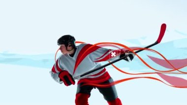 Genç bir adam, profesyonel hokey oyuncusu koruyucu üniforma eğitimi alıyor, arka planda izole edilmiş. Hareket etmeyi, animasyonu durdurun. Modern tasarım. Kış sporları anlayışı, sağlıklı yaşam tarzı, reklam