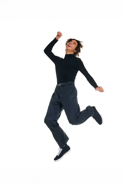 Full Length Portrait Happy Joyful Curly Young Man Jumping Isolated — Stock Photo, Image