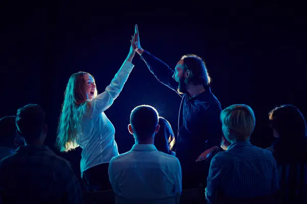 High five. Employees, partner, colleagues attending business meeting, reaching professional goals. Goals. Concept of business and education, partnership, coaching and entrepreneurship, strategy