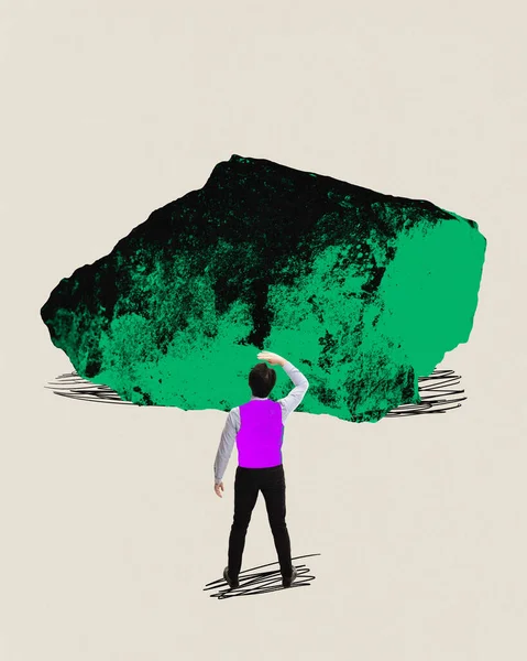 Businessman standing near giant stone and looking away, trying to predict future paths. Contemporary art collage. Concept of business, office, challenges and professional troubles, surrealism.