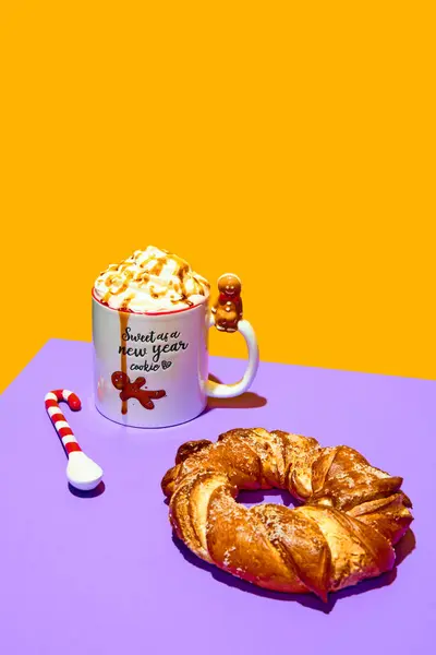 Mug with delicious sweet drink, coffee, hot chocolate with whipped cream and caramel against purple yellow background. Concept of winter season, Christmas holidays, traditional drinks, taste. Poster