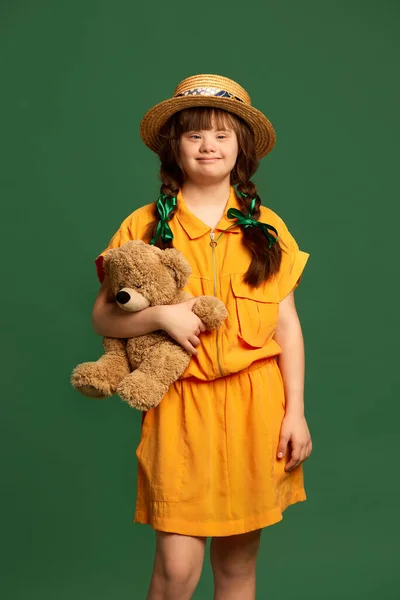 Little Girl Syndrome Wearing Yellow Dress Hat Standing Bear Toy — Stock Photo, Image