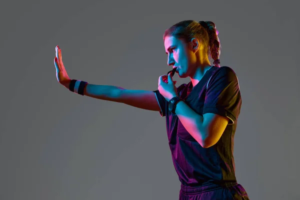 Athletic Pose Young Woman Referee Blowing Whistle Serious Expression Grey — Stock Photo, Image