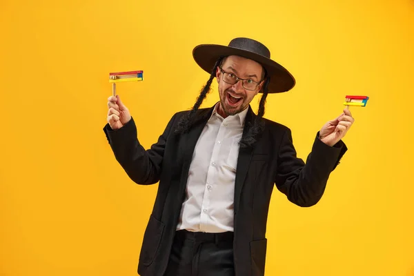 Cheerful Jewish Man Hat Sidelocks Holding Noisemaker Yellow Background Celebration — Stock Photo, Image
