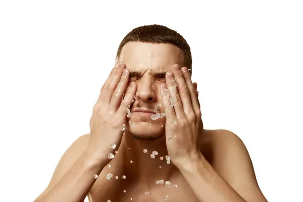 Young Brunette Man Spraying Water His Face Shaving White Studio — Stock Photo, Image