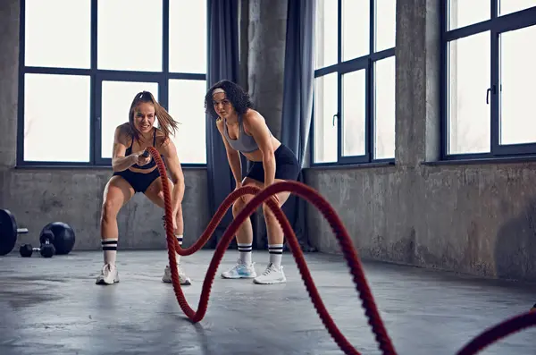 Focused Female Athletes Bodybuilders Using Heavy Ropes Training Motion Industrial — Stock Photo, Image
