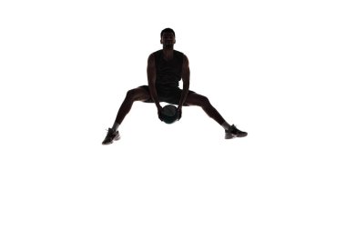 Silhouette of male athlete, basketball player in mid-air training, playing isolated on white background. Dynamics. Concept of professional sport, competition, game, tournament, action clipart