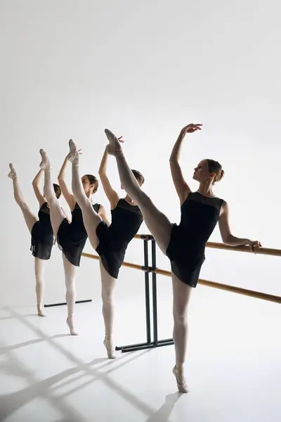 Artistic Ballet Pose Four Girls Ballet Dancers Studio Standing Barre — Stock Photo, Image