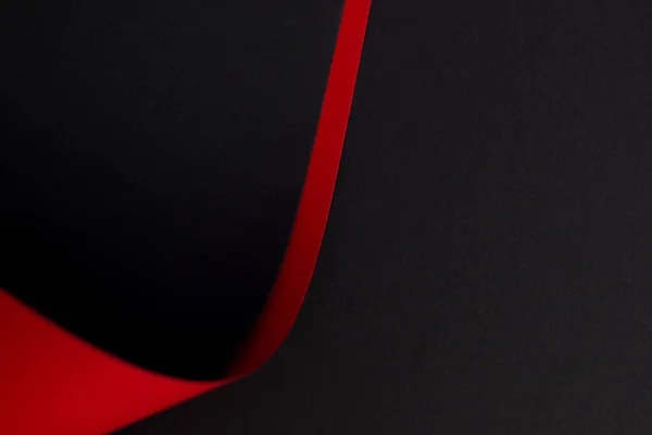 Curved red and black background, wallpaper