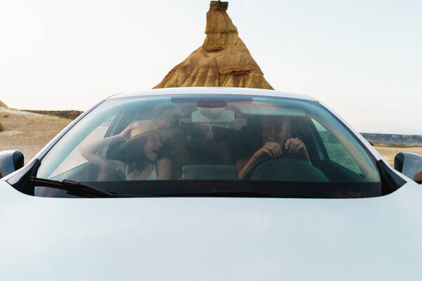 Young Couple Friends Roadtrip White Car Stock Photo
