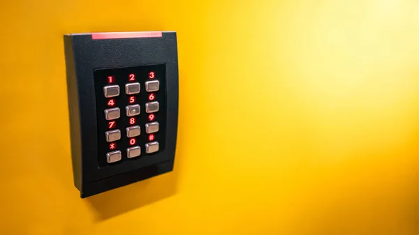 Numeric Keypad Smart Electronic Digital Door Lock Yellow Wall Password — Stock Photo, Image