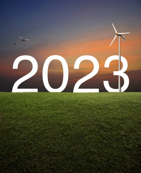 2023 Witte Tekst Met Windturbine Groen Grasveld Boven Zonsondergang Hemel — Stockfoto