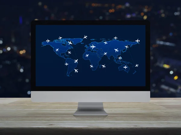 Flight routes airplanes connection and world map on computer screen on table over blur colorful night light city tower and skyscraper, Business airplane transportation network concept, Elements of this image furnished by NASA