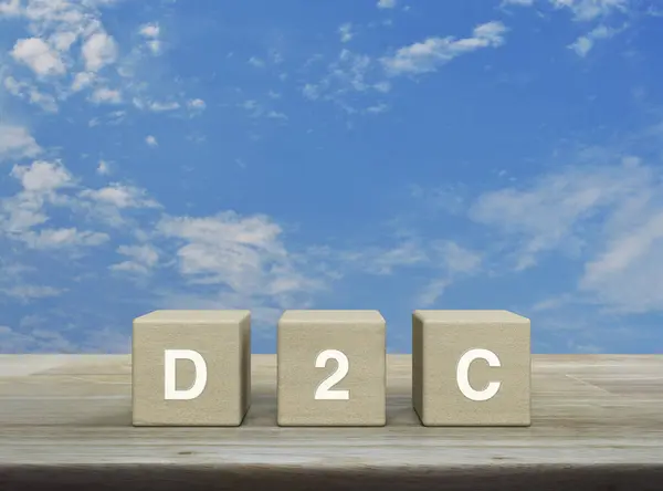D2C Acronym Wood Block Cubes Wooden Table Blue Sky White — Stok fotoğraf