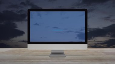 Masaüstü modern bilgisayar monitörü ekranında günbatımı semalarında ahşap masa üzerinde çalma tuşu, teknoloji müziği çevrimiçi konsepti