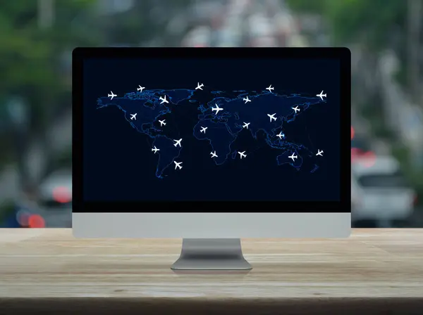 Flight routes airplanes connection and world map on computer monitor screen on table over blur of rush hour road, Business airplane transportation network concept, Elements of this image furnished by NASA