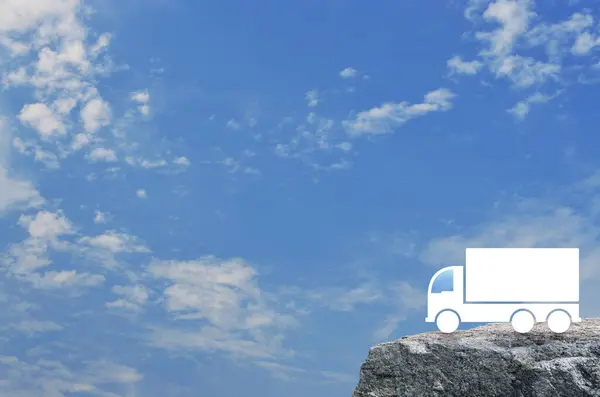 Truck icon on rock mountain over blue sky with white clouds, Business transportation service concept