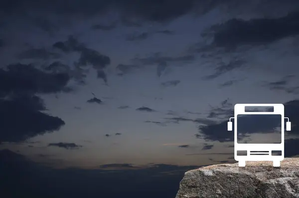 Bus icon on rock mountain over sunset sky, Business transportation service concept