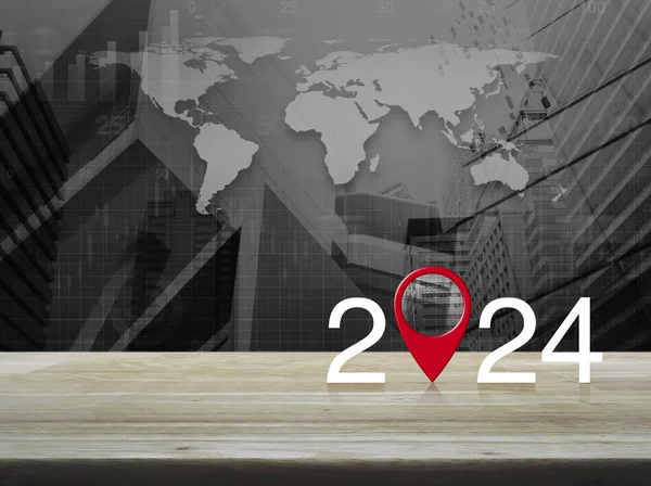 2024 letter with map pin location icon on wooden table over black and white world map with modern city tower and skyscraper, Happy new year 2024 map pointer navigation concept, Elements of this image furnished by NASA